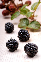 Blackberries on a wooden board