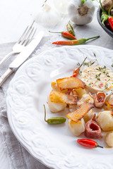 Jerusalem artichoke au gratin with ham and chili