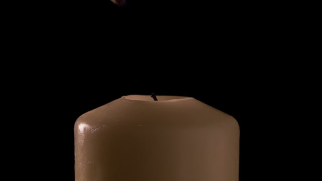 setting candle in the dark, narrow dof 1080 RAW footage