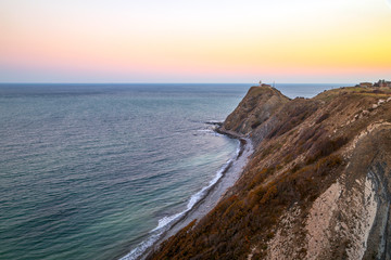 Fototapeta na wymiar Rocky coast at sunset