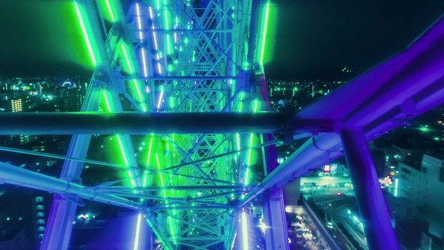 Ferris wheel POV time lapse (hyperlapse) above the city at night
