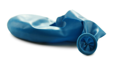 Popped blue balloon isolated on white