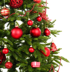 Decorated Christmas tree close-up isolated on white