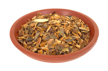 Wild harvested cherry tree bark in a small bowl