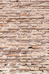 Detail of a wall of Colosseum in Rome, Italy