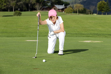 beautiful senior female golf player