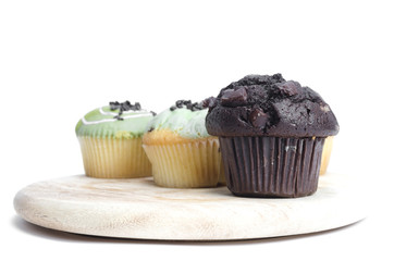 Chocolate muffin cake isolated on white