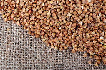 Buckwheat on sackcloth background
