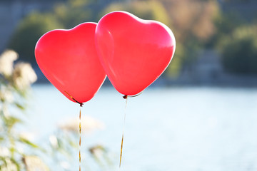 Love heart balloons, outdoors