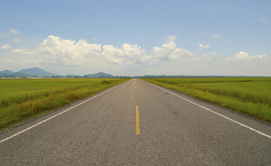 Empty asphalt road with blue sky