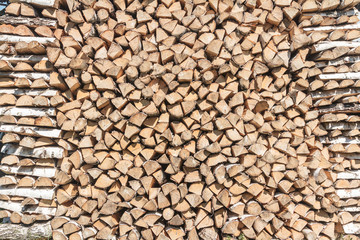 Stack of split birch firewood during drying