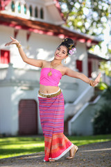 Thai dancing girl with northern style dress in temple - 72701268