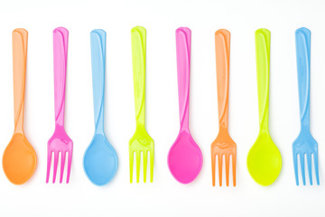 Colorful fork and spoon on white background - 72702405