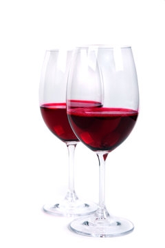 two glass of red wine on a white background