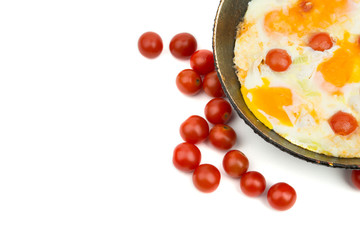 eggs with cherry tomatoes in a pan