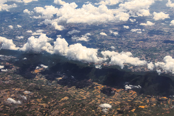 Aerial view of clouds and village © aiaikawa