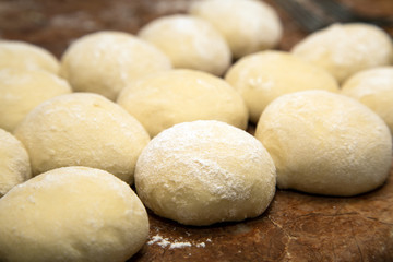 Fototapeta na wymiar pieces of dough for pies
