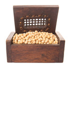 Soybean in wooden box over white background