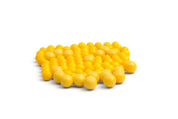 Yellow tablets strayed from its packaging