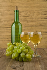 Obraz premium glasses of wine and bottle
