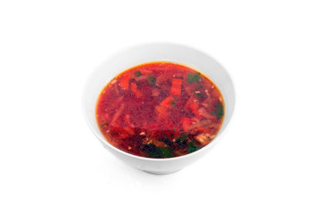 white Bowl of soup - borsch with parsley
