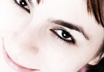 Naklejka premium Beautiful young woman face.