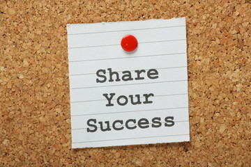The phrase Share Your Success on a notice board
