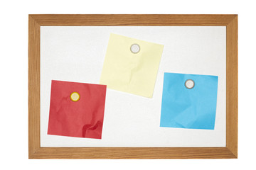 old magnetic message board with some paper notes, isolated on wh