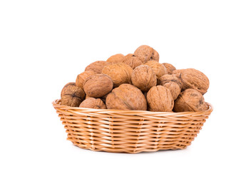 Wicker basket full of walnuts