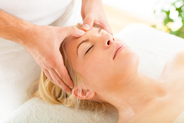 Fototapeta na wymiar Massaging Forehead