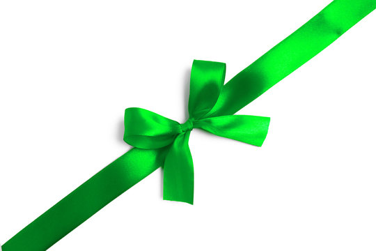 Green ribbon bow on white background