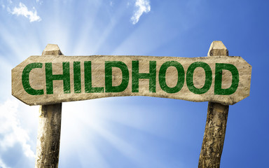 Childhood sign with a beach on background