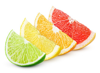 Sliced citrus fruit: lime, lemon, orange and grapefruit on white