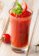 Tomato Cocktail  on  wooden table