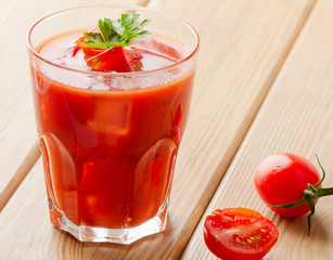 Tomato Cocktail  on a wooden table