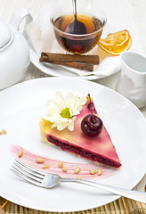 piece of cherry pie on a table in a restaurant