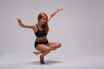 Woman gymnast stretching
