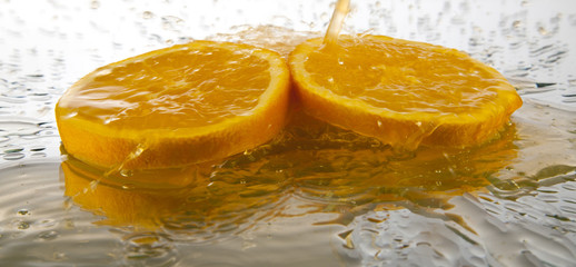 Fototapeta na wymiar orange juice splashing
