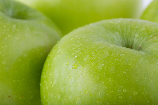 close-up image of apple fruit with water drops