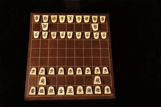 Backboard and pieces of Shogi