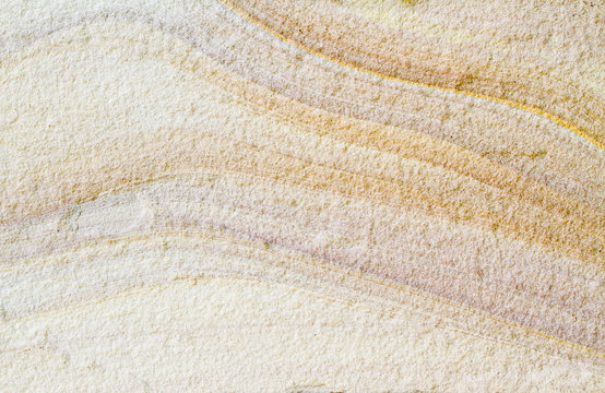 Patterned sandstone texture background.
