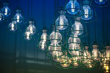 Fototapeta na wymiar Modern LED lamps in metal lampshades