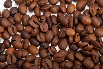 coffee beans close up isolated on white