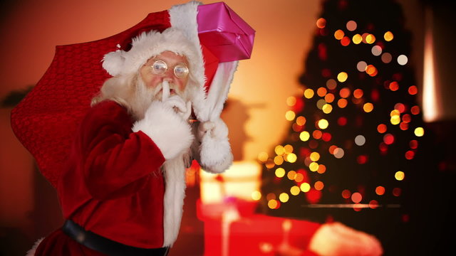 Santa delivering presents in a home