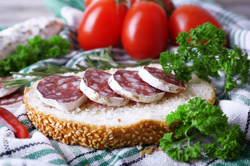 French salami with bread, tomatoes and parsley