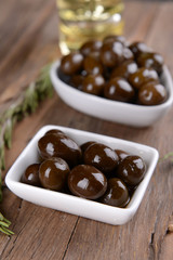 Marinated olives on table close-up