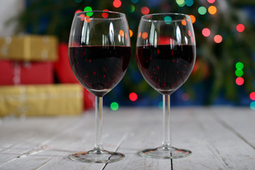 glasses of red wine with Christmas decoration