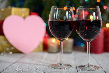glasses of red wine with Christmas decoration