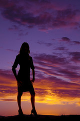 silhouette of woman stand heels hands down