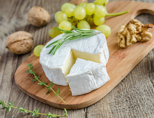 Camembert with walnuts and grape